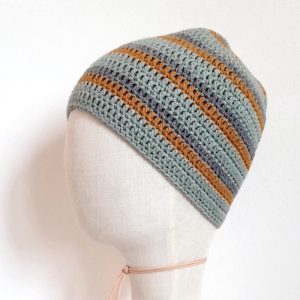 Merino Haube Kakadu in GOTS zertifizierter, nachhaltiger top Qualität. Handarbeit aus Österreich