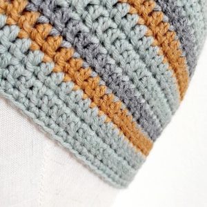 Merino Haube Kakadu in GOTS zertifizierter, nachhaltiger top Qualität. Handarbeit aus Österreich