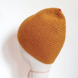 Merino Haube Märzsonne in GOTS zertifizierter, nachhaltiger top Qualität. Handarbeit aus Österreich