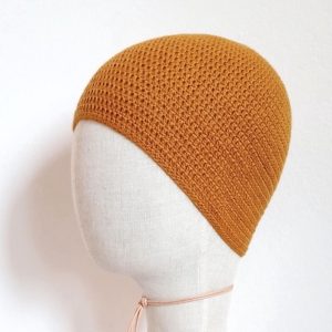 Merino Haube Märzsonne in GOTS zertifizierter, nachhaltiger top Qualität. Handarbeit aus Österreich